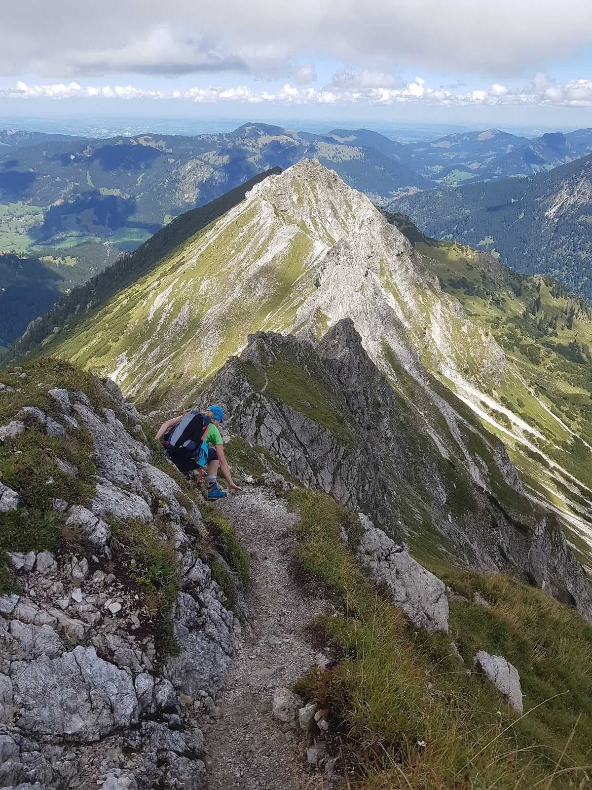 The 7-meter ladder descent on Hohe Gänge with climber looking down into void