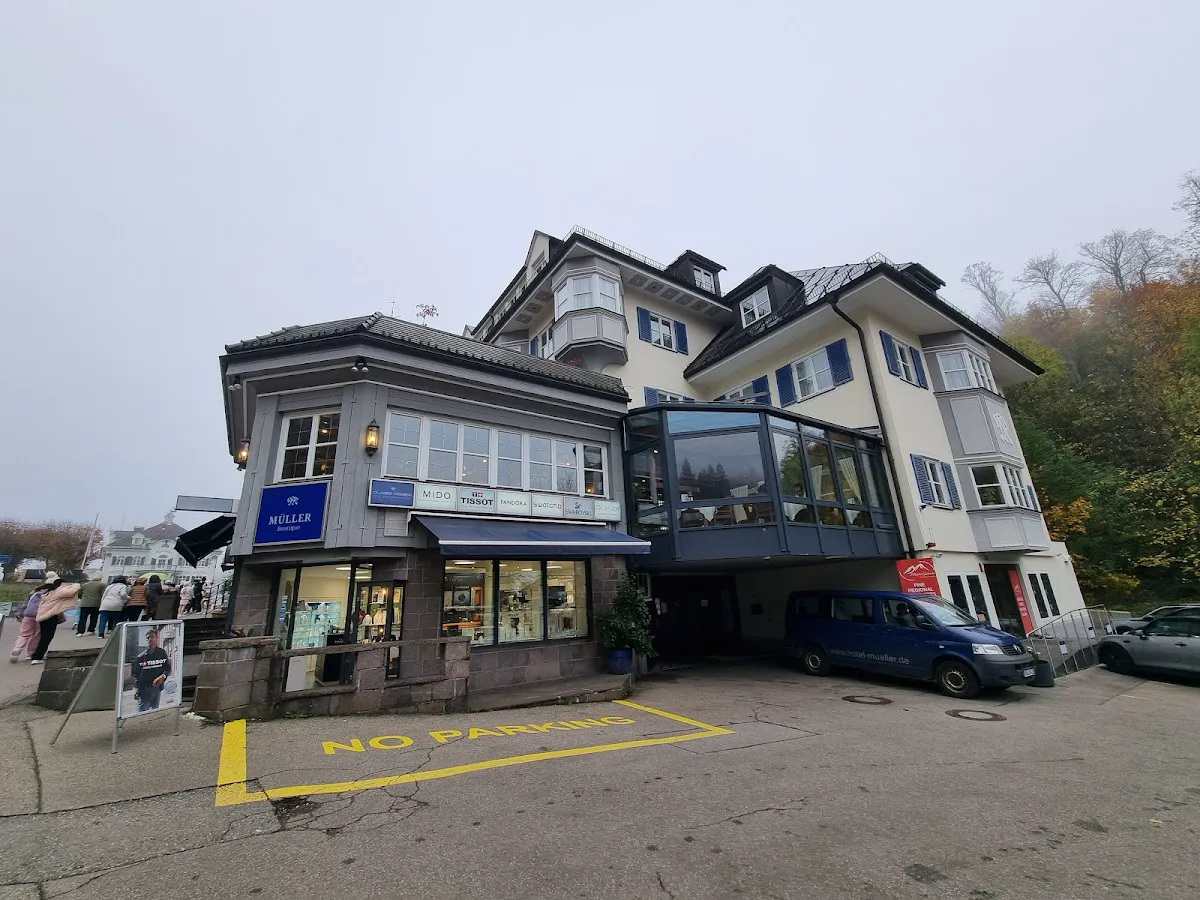 Night view of Highline 179 illuminated with LED lights against dark Austrian Alps