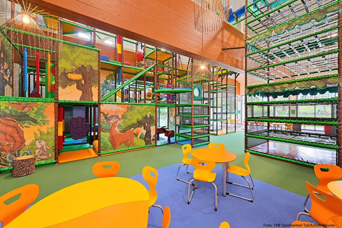 Paraglider launching from Neunerköpfle with Tannheimer Tal views