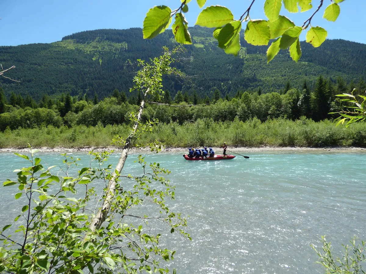 Canyoning rappel down waterfall in the Lechtal Alps tributary gorge