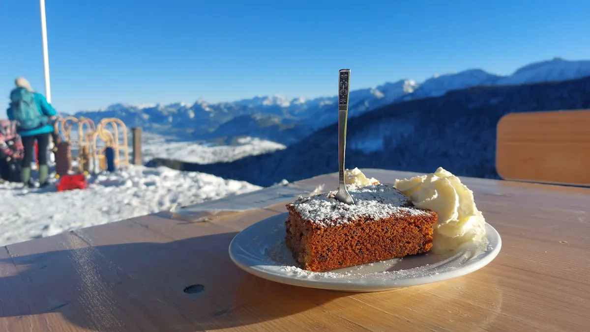 Hündeleskopfhütte vegetarian mountain hut in winter with snow-covered roof