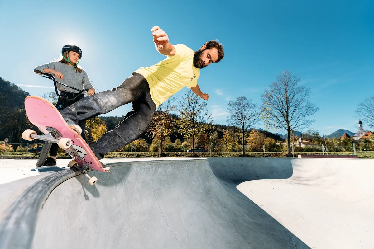 130-meter asphalt pump track at Füssen with Alps in background