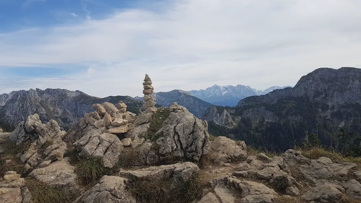 Gelbe Wand Via Ferrata with climber on iron rungs against yellow limestone