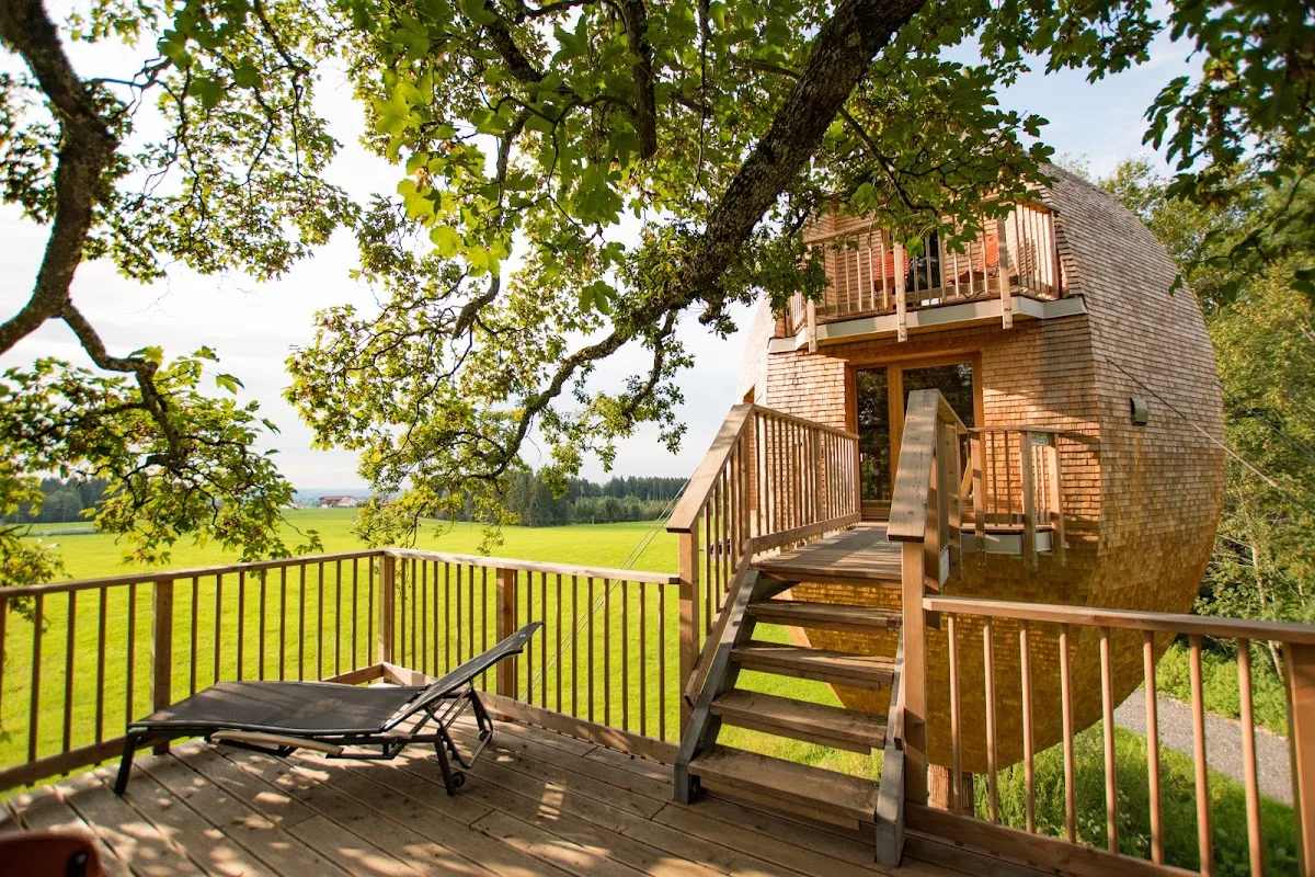 Guest ascending rope to portaledge using mechanical ascenders at Höllschlucht