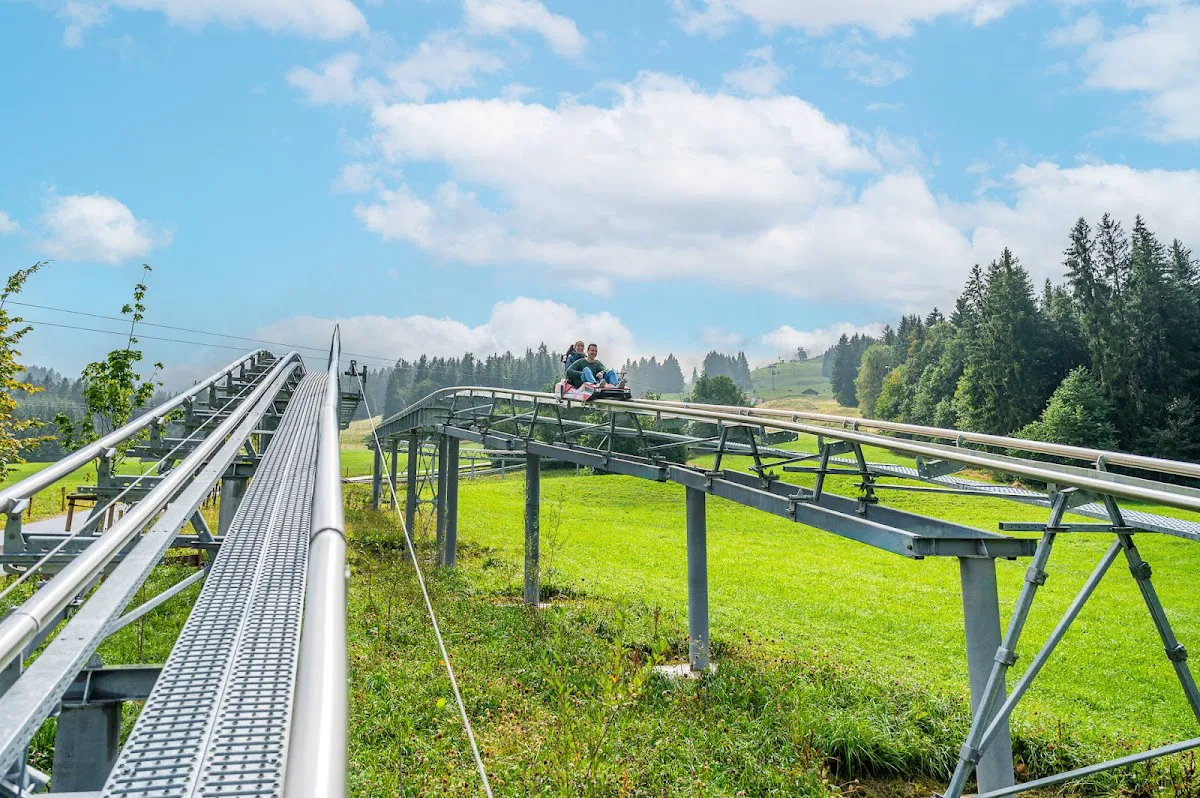 Elbigenalp village in Lechtal valley with surrounding Alps peaks
