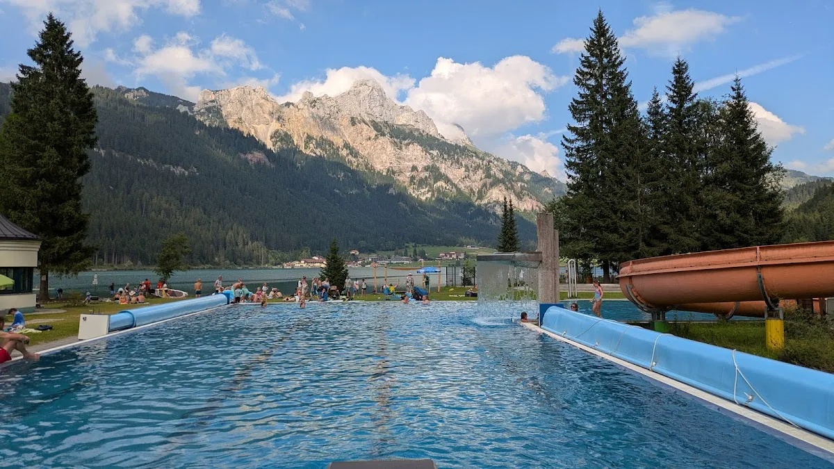 Solar-heated outdoor pools at Wasserwelt Haldensee with mountain views